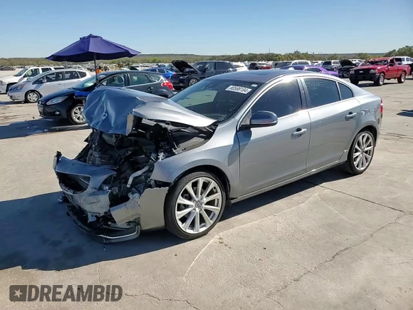 2017 Volvo S60 Inscription z VIN LYV402HK2HB150225, wystawiony jako Copart lot #80588184 z przebiegiem 53 910 mil mil oraz Szkoda całkowita • Salvage title. Historia ofert i sprzedaży dostępna na DreamBid. Obrazek 13.