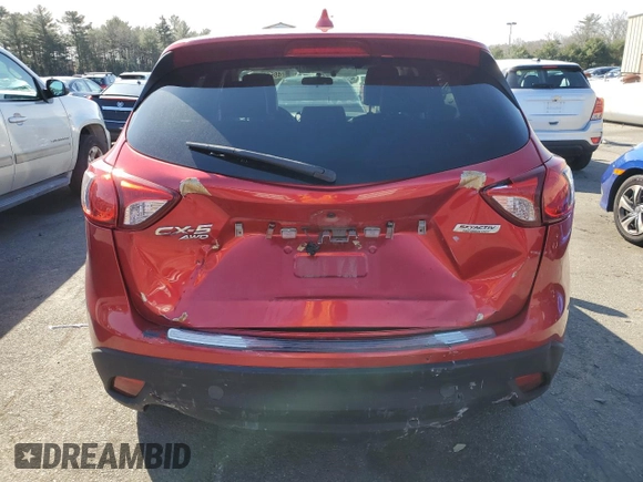 2014 Mazda CX-5 Grand Touring with VIN JM3KE4DY8E0421660, listed as a Copart auction lot 48588525 with 144,939 mi miles and Salvage Title. Bid and sale history available at DreamBid. Image 6.