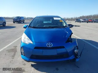 2013 Toyota Prius c One with VIN JTDKDTB32D1055135, listed as a IAAI auction lot 41889844 with 98,220 mi miles. Bid and sale history available at carsss.com. Image 13.