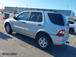 2001 Mercedes-Benz M-Class with VIN 4JGAB54E51A274528, listed as a IAAI auction lot 41290721 with 174,472 mi miles. Bid and sale history available at carsss.com. Image 3.