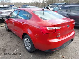 2014 Kia Rio LX with VIN KNADM4A31E6370963, listed as a IAAI auction lot 41720980 with 112,551 mi miles and . Bid and sale history available at DreamBid. Image 3.