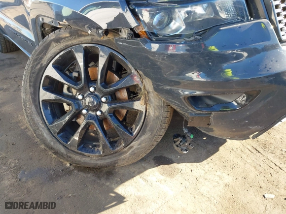 2018 Jeep Grand Cherokee Laredo E with VIN 1C4RJFAGXJC147400, listed as a IAAI auction lot 41358662 with 97,184 mi miles. Bid and sale history available at carsss.com. Image 18.