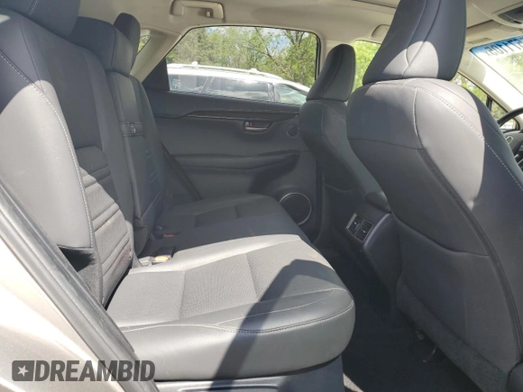 2016 Lexus NX 200t z VIN JTJBARBZ5G2052886, wystawiony jako Copart lot #55571105 z przebiegiem 104 501 mil mil oraz Szkoda całkowita • Salvage title. Historia ofert i sprzedaży dostępna na DreamBid. Obrazek 11.