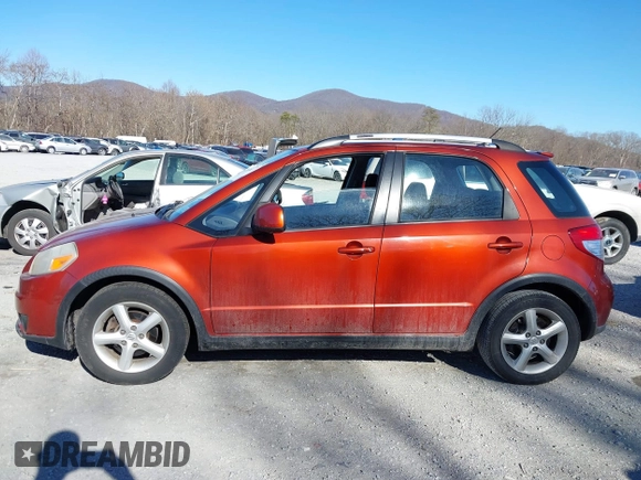 2009 Suzuki SX4 Touring AWD z VIN JS2YB417595100925, wystawiony jako IAAI lot #41693882 z przebiegiem 76 972 mil mil oraz . Historia ofert i sprzedaży dostępna na DreamBid. Obrazek 15.