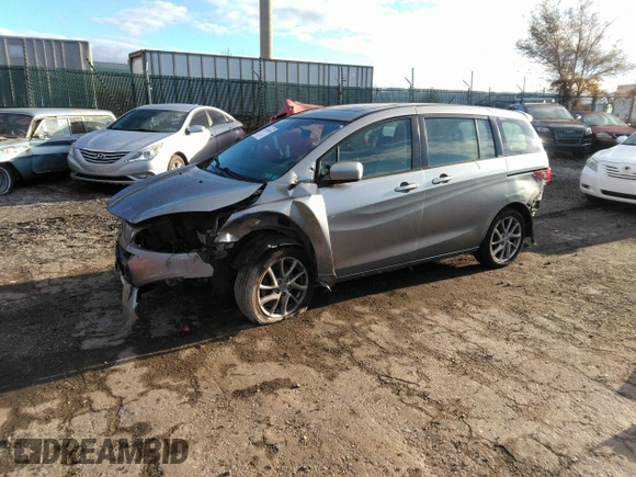 2012 Mazda 5 Grand Touring with VIN JM1CW2DL9C0121660, listed as a IAAI auction lot 38250695 with 119,389 mi miles. Bid and sale history available at carsss.com. Image 2.