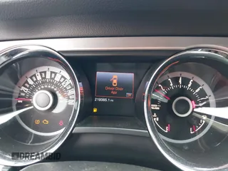 2013 Ford Mustang GT with VIN 1ZVBP8CF4D5268218, listed as a IAAI auction lot 41555868 with 219,385 mi miles. Bid and sale history available at carsss.com. Image 7.