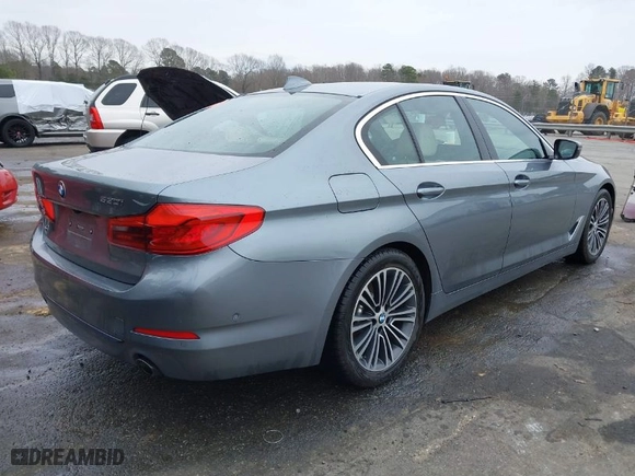 2019 BMW 5 Series 530i with VIN WBAJA5C52KWW05656, listed as a IAAI auction lot 41741419 with 67,499 mi miles. Bid and sale history available at carsss.com. Image 4.