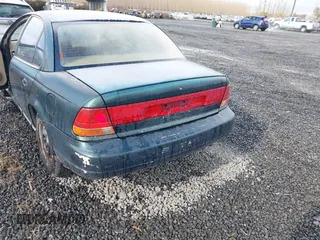1997 Saturn SL with VIN 1G8ZK5276VZ329694, listed as a IAAI auction lot 41792109 with 208,002 mi miles and . Bid and sale history available at DreamBid. Image 6.