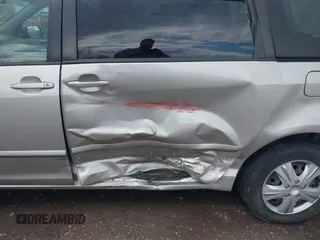 2010 Toyota Sienna CE with VIN 5TDKK4CC1AS339607, listed as a IAAI auction lot 41891135 with 261,666 mi miles. Bid and sale history available at carsss.com. Image 6.