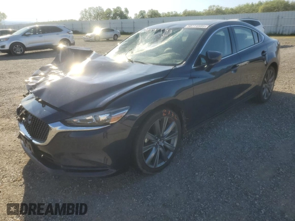 2019 Mazda 6 Touring with VIN JM1GL1VM5K1502586, listed as a Copart auction lot 50774985 with 70,088 mi miles and Salvage Title. Bid and sale history available at carsss.com. Image 1.