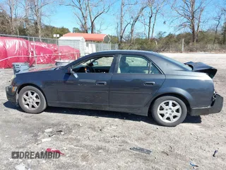2005 Cadillac CTS with VIN 1G6DP567150204346, listed as a IAAI auction lot 41643967 with 214,221 mi miles. Bid and sale history available at carsss.com. Image 14.