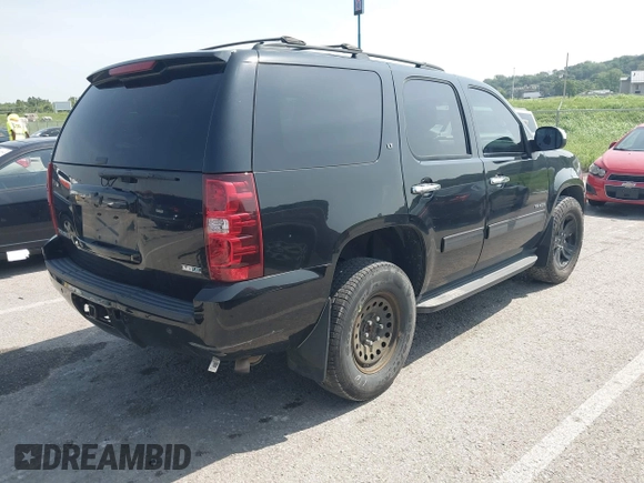 2012 Chevrolet Tahoe LT with VIN 1GNSKBE01CR311712, listed as a IAAI auction lot 42804916 with 225,786 mi miles and . Bid and sale history available at DreamBid. Image 4.