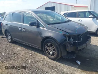 2011 Honda Odyssey EX-L with VIN 5FNRL5H60BB018121, listed as a IAAI auction lot 42559066 with 127,437 mi miles and . Bid and sale history available at DreamBid. Image 1.