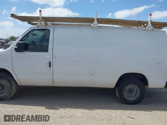 2013 Ford Econoline Cargo Commercial with VIN 1FTSE3EL4DDA38215, listed as a IAAI auction lot 41627924 with 181,821 mi miles. Bid and sale history available at carsss.com. Image 14.
