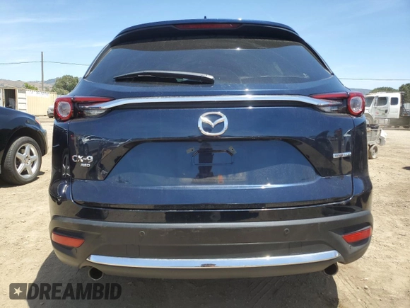 2021 Mazda CX-9 Grand Touring with VIN JM3TCBDY6M0520443, listed as a Copart auction lot 57403735 with 31,414 mi miles and Salvage title. Bid and sale history available at DreamBid. Image 6.