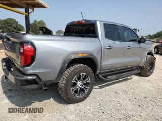 2024 GMC Canyon 4WD AT4 with VIN 1GTP6DEK9R1116173, listed as a Copart auction lot 71005134 with 5,298 mi miles and Salvage Title. Bid and sale history available at carsss.com. Image 3.