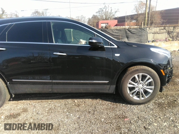 2022 Cadillac XT5 AWD Premium Luxury with VIN 1GYKNDR4XNZ164098, listed as a IAAI auction lot 41822372 with 32,644 mi miles and . Bid and sale history available at DreamBid. Image 13.