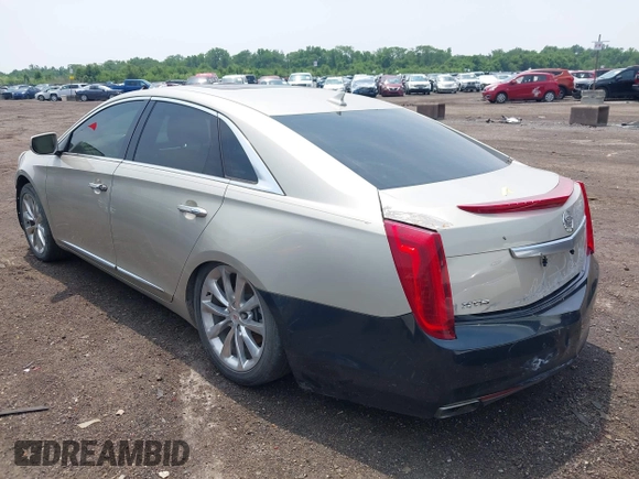 2014 Cadillac XTS Luxury z VIN 2G61M5S38E9291182, wystawiony jako IAAI lot #42495838 z przebiegiem 104 941 mil mil oraz . Historia ofert i sprzedaży dostępna na DreamBid. Obrazek 3.