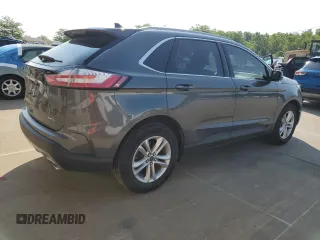 2020 Ford Edge SEL с VIN 2FMPK3J97LBB58552, выставлен на аукционе Copart как лот 58472995 с пробегом 71 387 миль миль и Списание • Salvage title. История ставок и продаж доступна на DreamBid. Изображение 3.
