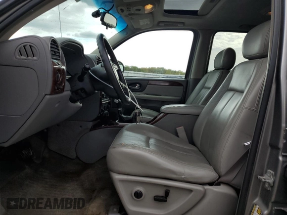 2005 GMC Envoy SLT with VIN 1GKDT13S952155528, listed as a Copart auction lot 76095784 with 212,458 mi miles and Clean Title. Bid and sale history available at DreamBid. Image 7.