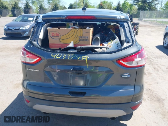 2016 Ford Escape SE z VIN 1FMCU9GX1GUB92472, wystawiony jako IAAI lot #42133744 z przebiegiem 184 000 mil mil oraz . Historia ofert i sprzedaży dostępna na DreamBid. Obrazek 15.