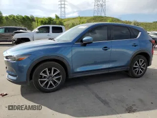 2018 Mazda CX-5 Grand Touring с VIN JM3KFBDM2J0347208, выставлен на аукционе Copart как лот 59357135 с пробегом 61 537 миль миль и Чистый • Clean title. История ставок и продаж доступна на DreamBid. Изображение 1.