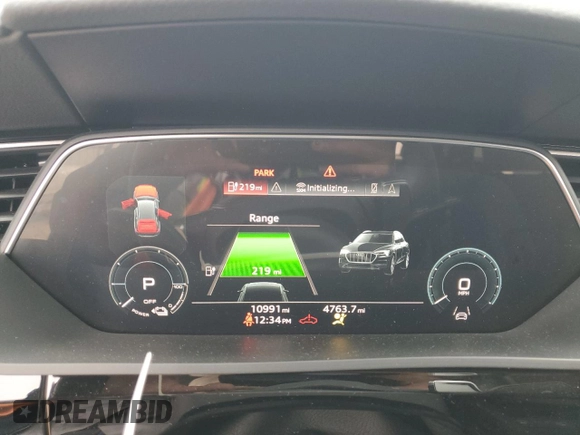 2022 Audi e-tron Premium with VIN WA1AAAGE4NB042461, listed as a Copart auction lot 83235624 with 10,991 mi miles and Salvage title. Bid and sale history available at DreamBid. Image 9.