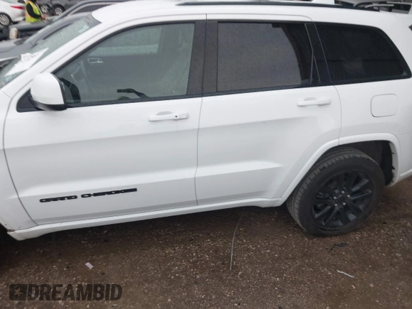 2018 Jeep Grand Cherokee Altitude with VIN 1C4RJFAG4JC320599, listed as a IAAI auction lot 42182661 with 70,957 mi miles and . Bid and sale history available at DreamBid. Image 14.