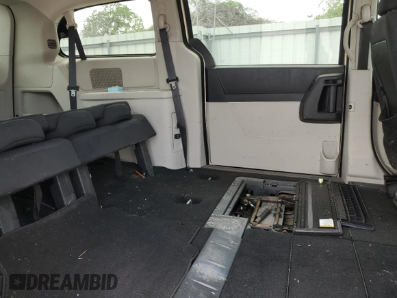 2010 Dodge Grand Caravan with VIN 2D4RN5D12AR197403, listed as a Copart auction lot 54356515 with 105,318 mi miles and Salvage Title. Bid and sale history available at DreamBid. Image 11.