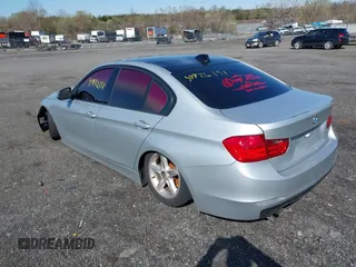 2012 BMW 3 Series 328i with VIN WBA3A5C55CFJ89595, listed as a IAAI auction lot 41926151 with 210,946 mi miles. Bid and sale history available at carsss.com. Image 3.