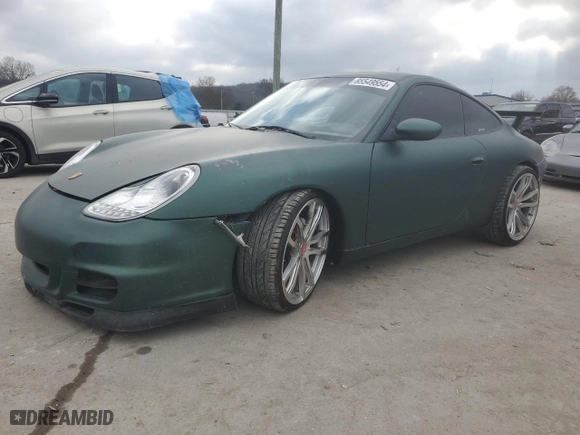 1999 Porsche 911 Carrera with VIN WP0AA299XXS623462, listed as a Copart auction lot 85549554 with NaN miles and Salvage Title. Bid and sale history available at carsss.com. Image 1.
