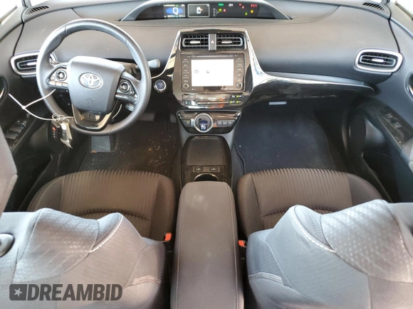 2021 Toyota Prius LE z VIN JTDKAMFP6M3183538, wystawiony jako Copart lot #54267425 z przebiegiem 29 374 mil mil oraz Szkoda całkowita • Salvage title. Historia ofert i sprzedaży dostępna na DreamBid. Obrazek 8.