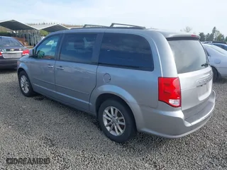2015 Dodge Grand Caravan SXT with VIN 2C4RDGCG6FR556633, listed as a IAAI auction lot 42002783 with 157,341 mi miles. Bid and sale history available at carsss.com. Image 3.