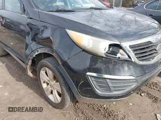 2012 Kia Sportage LX with VIN KNDPB3A23C7203826, listed as a IAAI auction lot 41464022 with 260,980 mi miles. Bid and sale history available at carsss.com. Image 6.