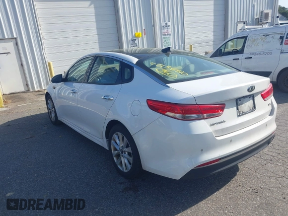 2016 Kia Optima EX with VIN 5XXGU4L32GG070138, listed as a IAAI auction lot 42138810 with 131,040 mi miles. Bid and sale history available at carsss.com. Image 3.