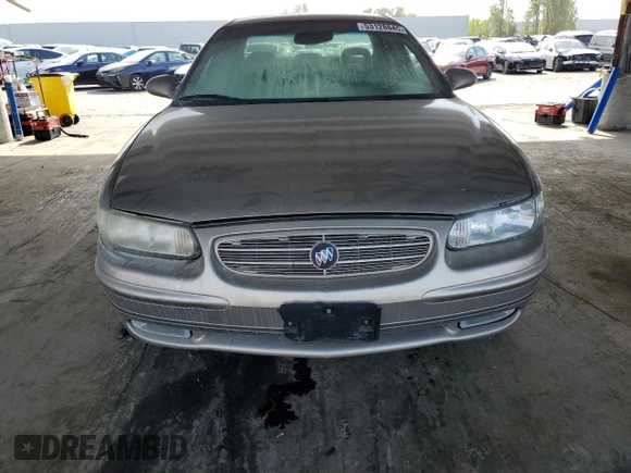2001 Buick Regal LS z VIN 2G4WB55K011250108, wystawiony jako Copart lot #53128645 z przebiegiem Nie podano mil oraz Szkoda całkowita • Salvage title. Historia ofert i sprzedaży dostępna na DreamBid. Obrazek 5.