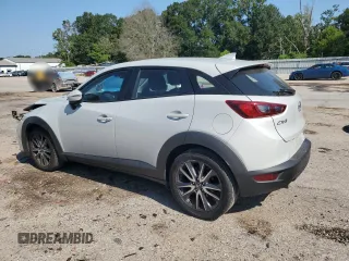 2018 Mazda CX-3 Touring with VIN JM1DKDC75J0329502, listed as a Copart auction lot 68061054 with 92,238 mi miles and Salvage Title. Bid and sale history available at carsss.com. Image 2.