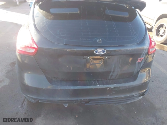 2015 Ford Focus ST with VIN 1FADP3L95FL339181, listed as a IAAI auction lot 41397051 with 124,656 mi miles. Bid and sale history available at carsss.com. Image 17.
