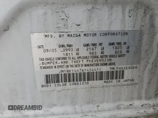 2006 Mazda 3 S Sport with VIN JM1BK144761434411, listed as a Copart auction lot 48255625 with 106,251 mi miles and Salvage Title. Bid and sale history available at DreamBid. Image 12.