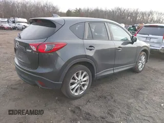 2015 Mazda CX-5 Grand Touring with VIN JM3KE4DY5F0470445, listed as a IAAI auction lot 41236468 with 87,845 mi miles. Bid and sale history available at carsss.com. Image 4.