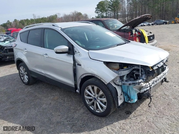 2017 Ford Escape Titanium with VIN 1FMCU0J98HUA45380, listed as a IAAI auction lot 41726720 with 57,400 mi miles. Bid and sale history available at carsss.com. Image 1.