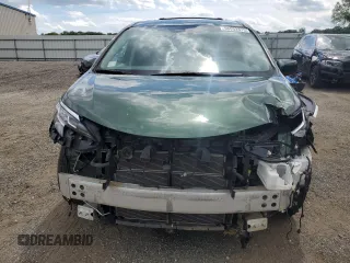 2021 Toyota Sienna LE with VIN 5TDBSKFC4MS027897, listed as a Copart auction lot 56052375 with 66,604 mi miles and Salvage title. Bid and sale history available at DreamBid. Image 5.