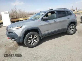 2015 Jeep Cherokee Trailhawk with VIN 1C4PJMBS3FW787033, listed as a Copart auction lot 49176735 with 83,013 mi miles and Salvage Title. Bid and sale history available at carsss.com. Image 1.