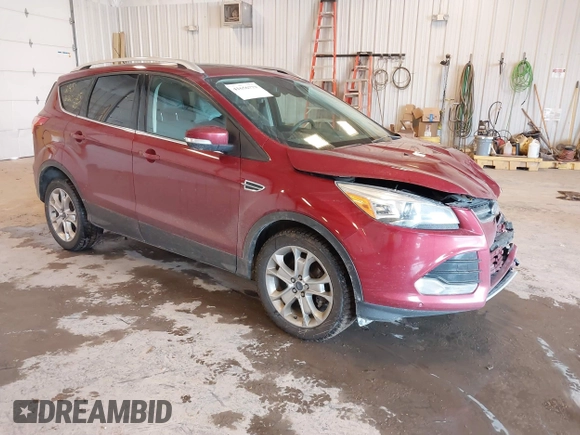 2014 Ford Escape Titanium with VIN 1FMCU0JX6EUC58726, listed as a IAAI auction lot 41656779 with 162,888 mi miles. Bid and sale history available at carsss.com. Image 1.