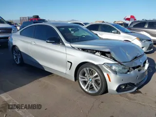 2015 BMW 4 Series 428i with VIN WBA3N7C54FK225045, listed as a IAAI auction lot 42042980 with 72,909 mi miles. Bid and sale history available at carsss.com. Image 1.