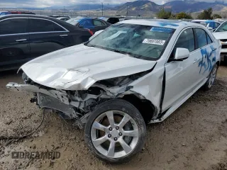 2016 Cadillac ATS Standard AWD z VIN 1G6AG5RX1G0157420, wystawiony jako Copart lot #70697003 z przebiegiem Nie podano mil oraz Szkoda całkowita • Salvage title. Historia ofert i sprzedaży dostępna na DreamBid. Obrazek 1.