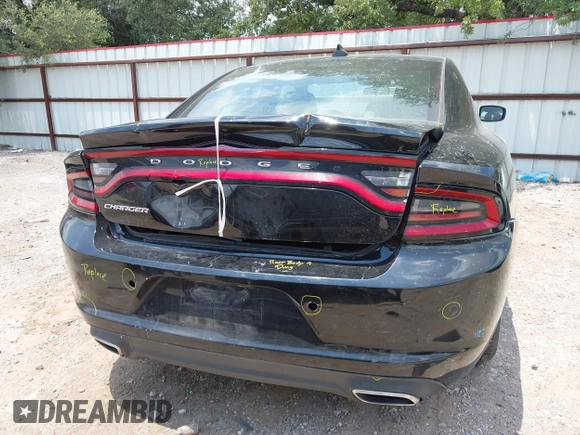 2023 Dodge Charger SXT z VIN 2C3CDXBG0PH564343, wystawiony jako IAAI lot #42351311 z przebiegiem 52 570 mil mil oraz . Historia ofert i sprzedaży dostępna na DreamBid. Obrazek 16.
