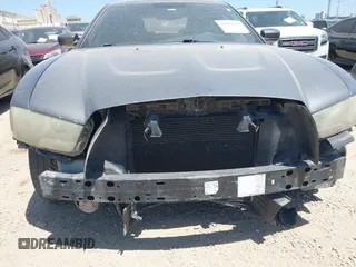 2012 Dodge Charger SE with VIN 2C3CDXBG5CH219805, listed as a IAAI auction lot 42002071 with 238,820 mi miles. Bid and sale history available at carsss.com. Image 6.