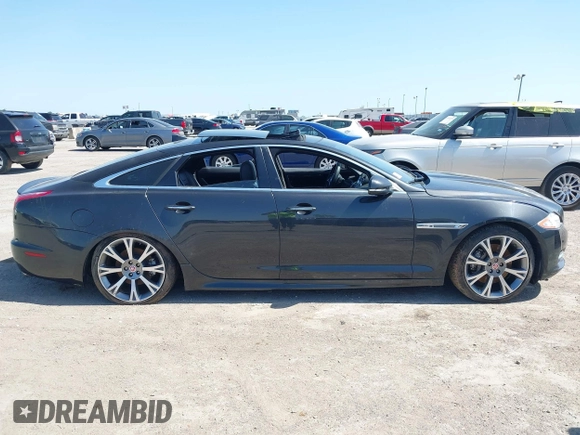 2015 Jaguar XJ R-Sport with VIN SAJWJ1CD6F8V83990, listed as a IAAI auction lot 41936162 with Not Provided miles and . Bid and sale history available at DreamBid. Image 13.