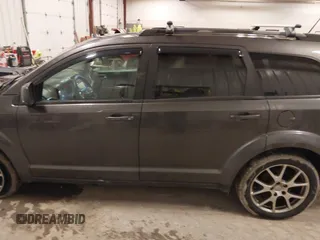 2017 Dodge Journey GT with VIN 3C4PDDEG4HT615357, listed as a IAAI auction lot 41672815 with 115,649 mi miles and . Bid and sale history available at DreamBid. Image 14.